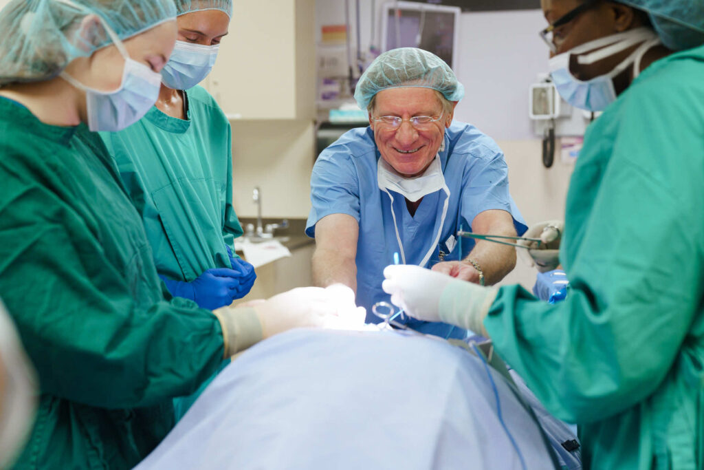 Doctor in surgery wuth students around in Colorado.